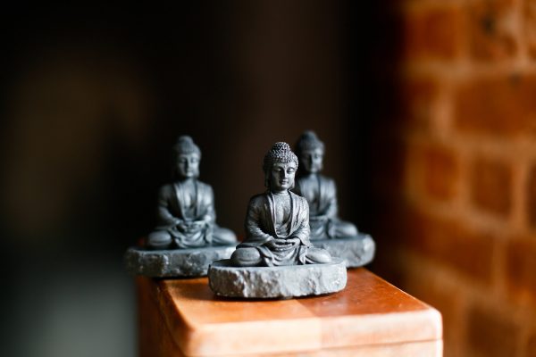 Shungite statue meditating buddha on shungite stand